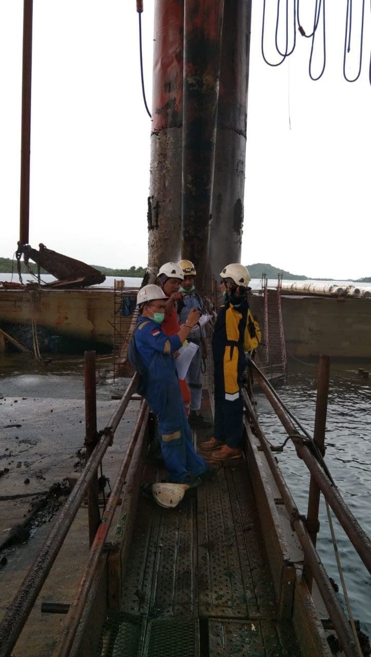 NDT inspection team on an offshore structure over water